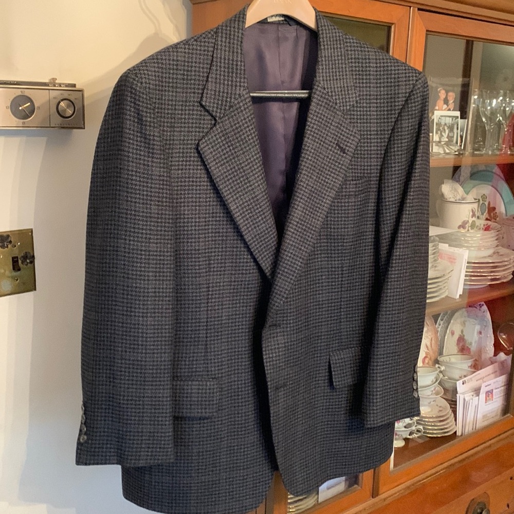 Hardly used wool blazer..Beautifully tailored. Tweed color